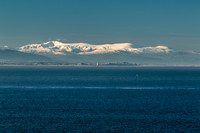 Point of Ayr Lighthouse with Snowdonia beyond. Taken from Hilbre