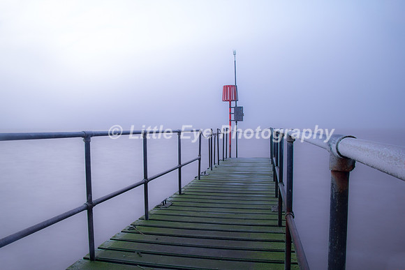 Misty morning at the jetty on West Kirby Marine Lake